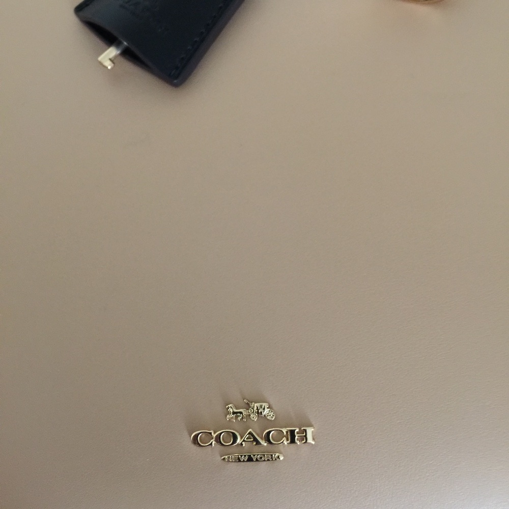 Black trim COACH purse